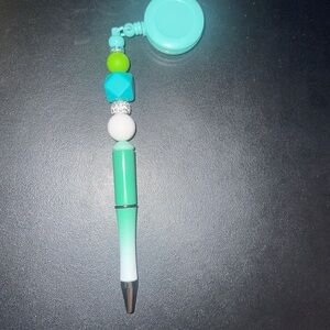 Teal badge reel focal pen